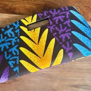 Handmade artisan clutch purse with global print design